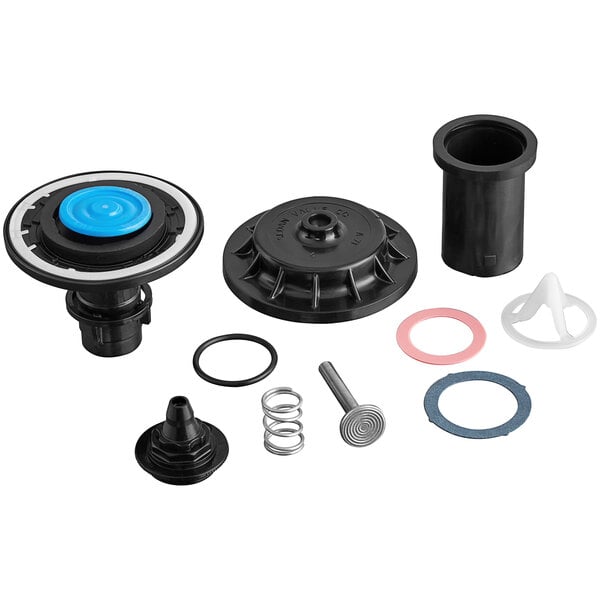 A Sloan Royal Diaphragm Tune Up Kit for water closets including a black water valve and other machine parts.