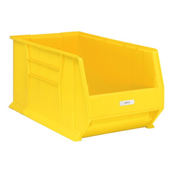 A yellow plastic bin with a white label reading "Regency" on it.