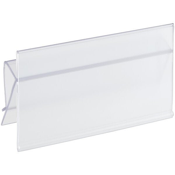 A clear plastic rectangular label holder clipped onto a white bin.