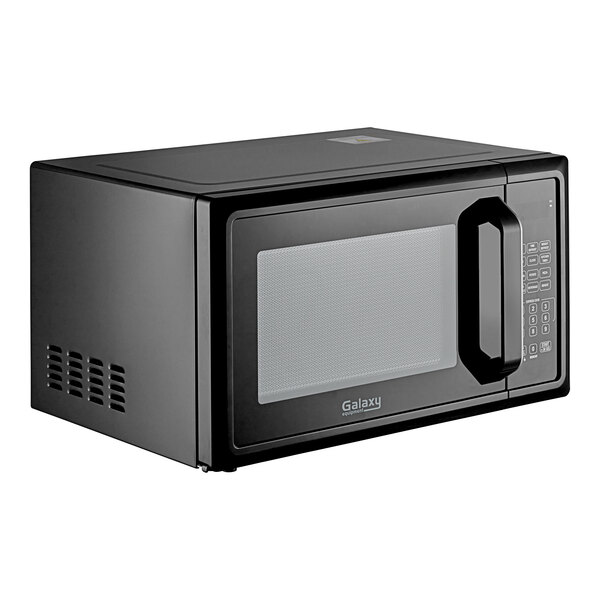 A black Galaxy office series microwave with a square door.