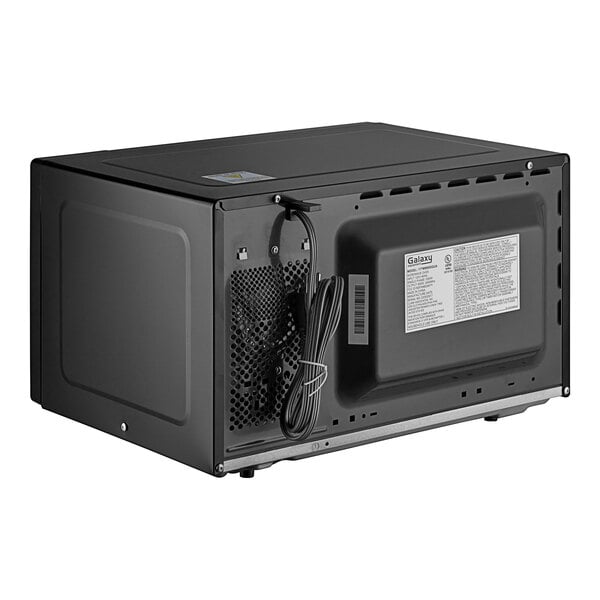 A black Galaxy office series microwave with a black power cord.