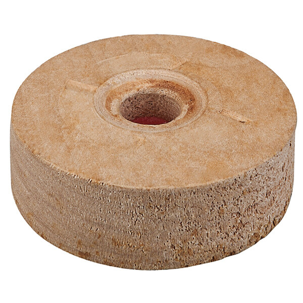 A round wooden disc with a hole in the middle.