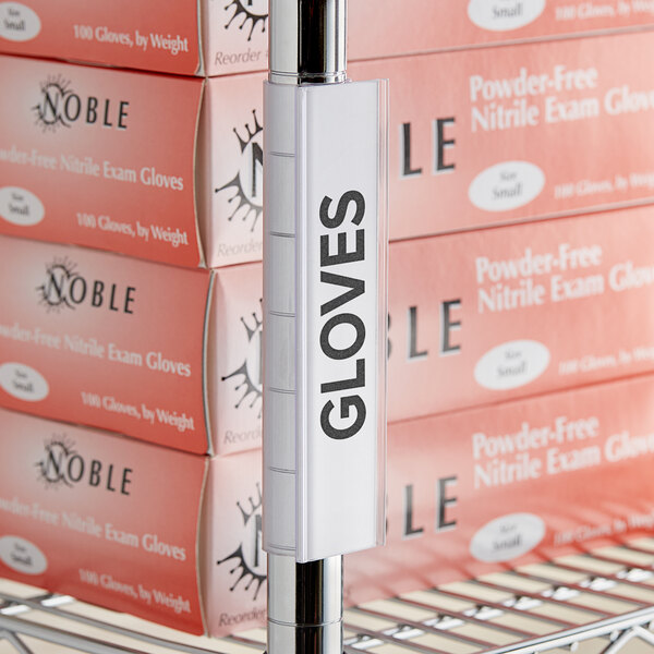 A shelf with a white label on it using Regency Space Solutions landscape label inserts.