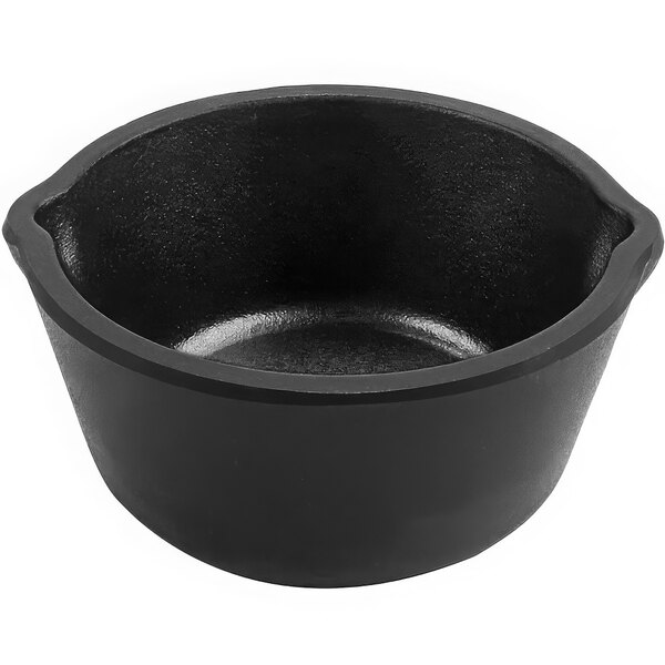 A black round melamine ramekin.