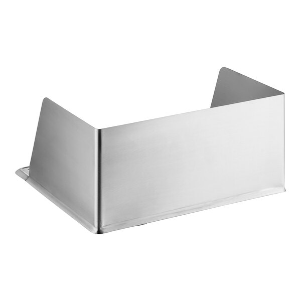A metal drip pan with a splash guard on a counter.