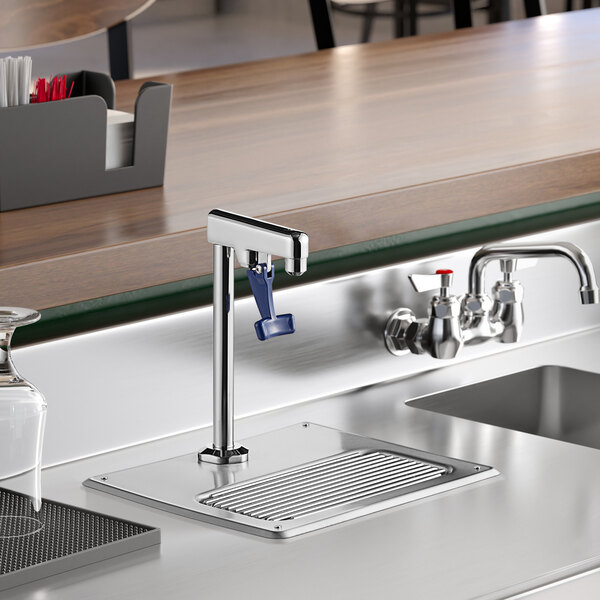 A Waterloo glass filler station with a glass filler faucet on a metal counter.