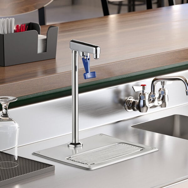 A Waterloo glass filler station faucet on a counter.