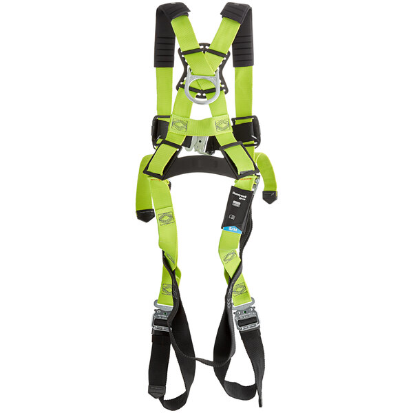 A green harness with black straps.