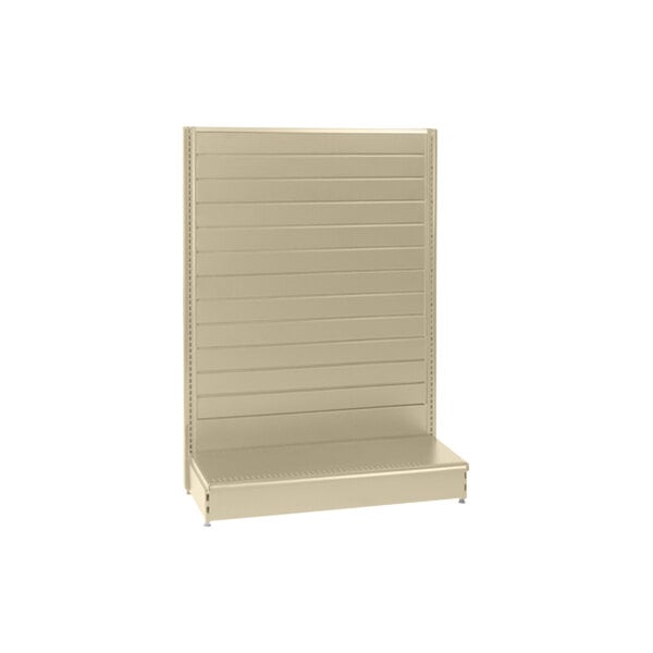 A beige slatwall gondola shelving unit with shelves on it.