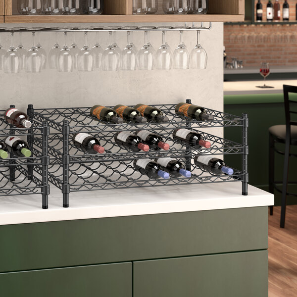 A black Regency wire wine shelf holding 16 bottles of wine.