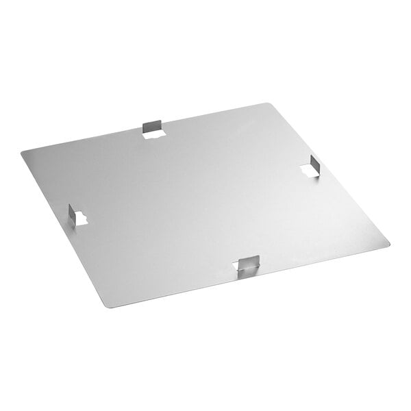 A white square metal plate with holes.