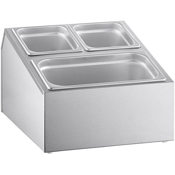 A silver stainless steel ServSense hotel pan organizer with three compartments holding four trays.