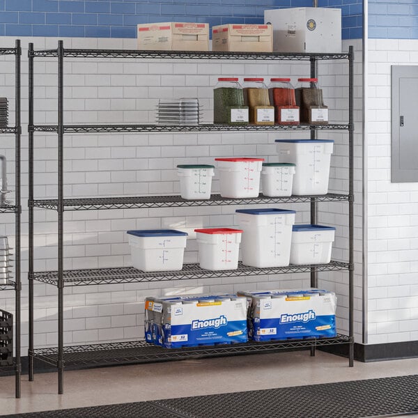 A black epoxy 5-shelf storage rack with various containers and boxes placed on the shelves.