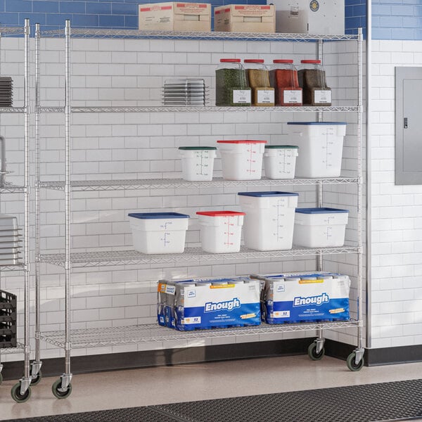 A chrome 5-shelf wire shelving unit with casters, used for storage in commercial or industrial settings.