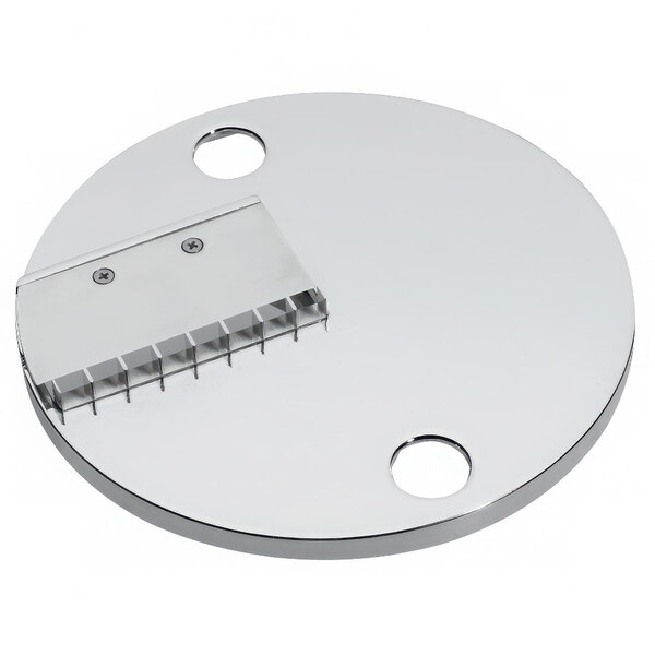 A silver circular Waring julienne disc with holes.