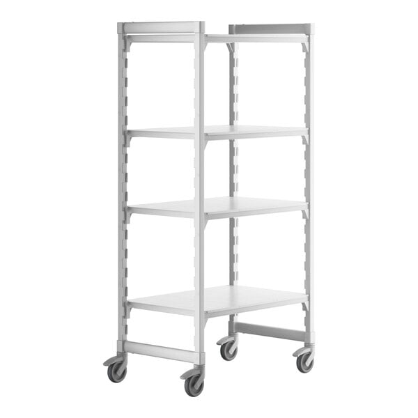 A white Cambro Camshelving® Premium mobile shelving unit with 4 shelves on wheels.