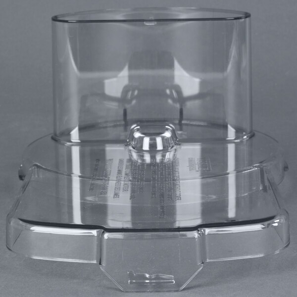 A clear plastic lid for a Waring commercial food processor.