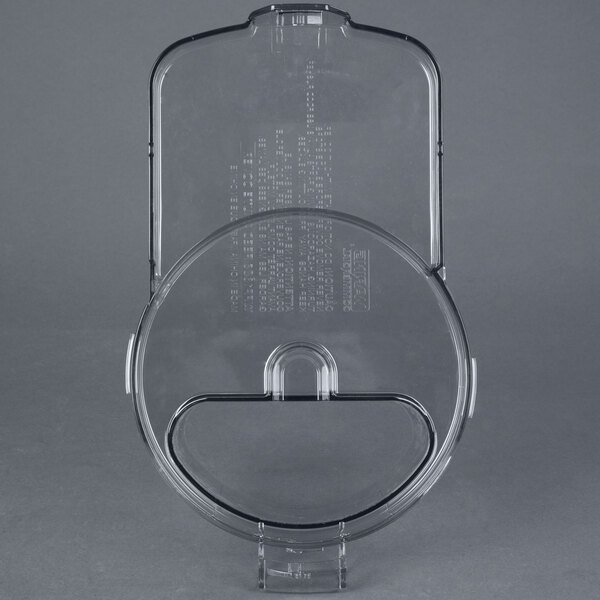 A clear plastic container with a round lid.