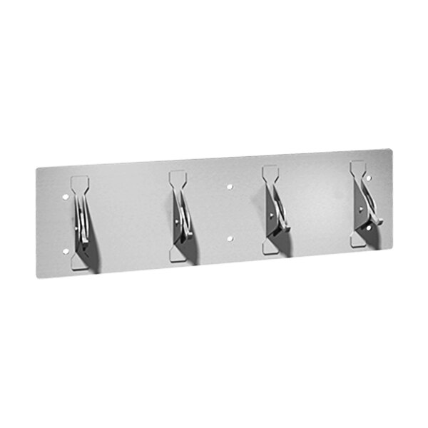 An American Specialties, Inc. wall mounted clothes hook strip with three hooks.