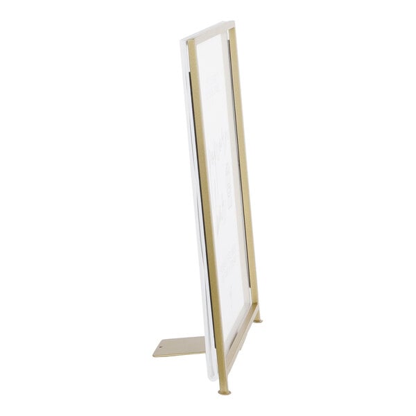 A gold frame displayette designed to hold and display signs or menus.