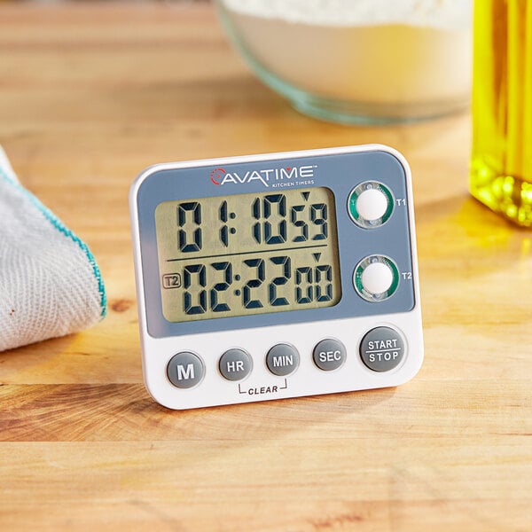 An AvaTime digital kitchen timer on a table.