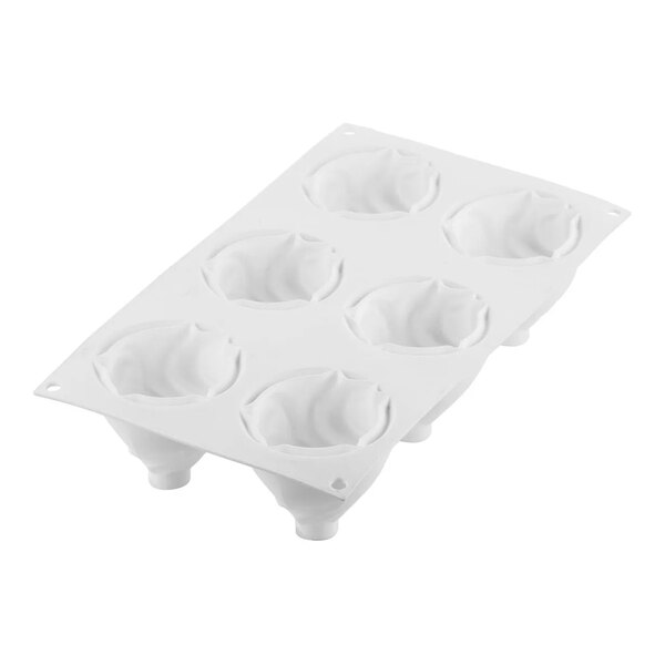 A white silicone baking mold with six curved compartments for making individual desserts or pastries.