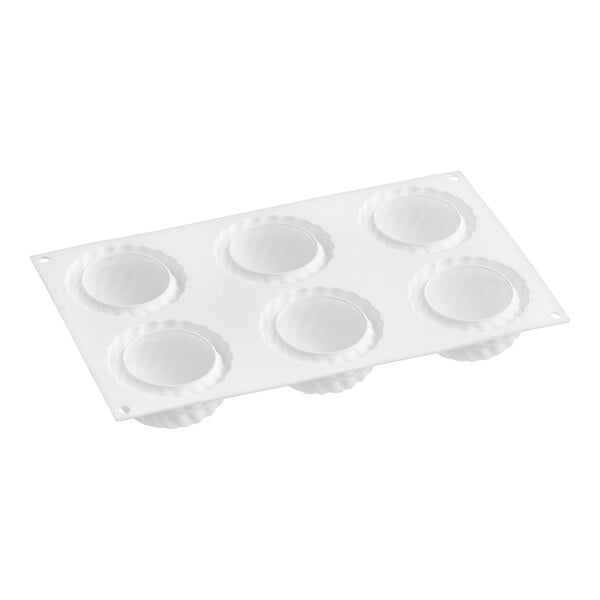 A white silicone mold with six rectangular cavities.
