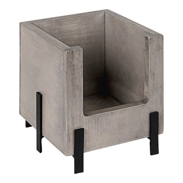 A grey square Cal-Mil Aspen stacking box with black legs.