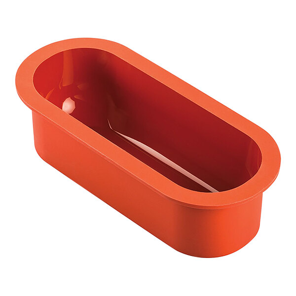 An orange Silikomart oval silicone baking mold.