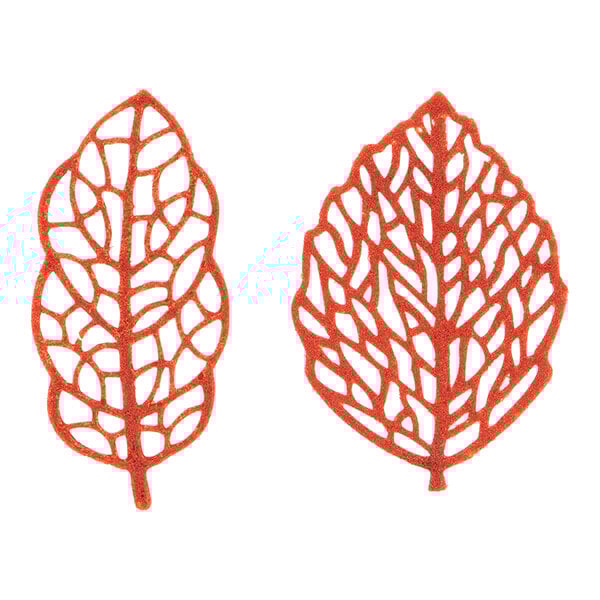 A pair of orange Silikomart FORESTA leaf molds with a leaf pattern.
