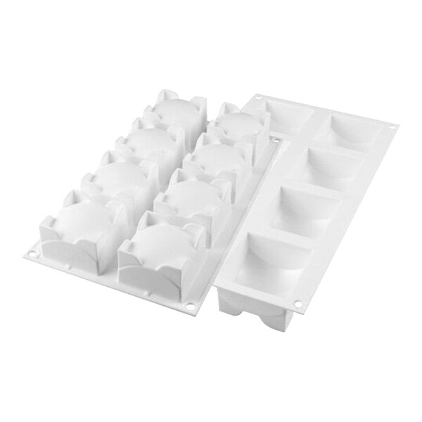 A white silicone baking mold with 8 square sphere compartments.