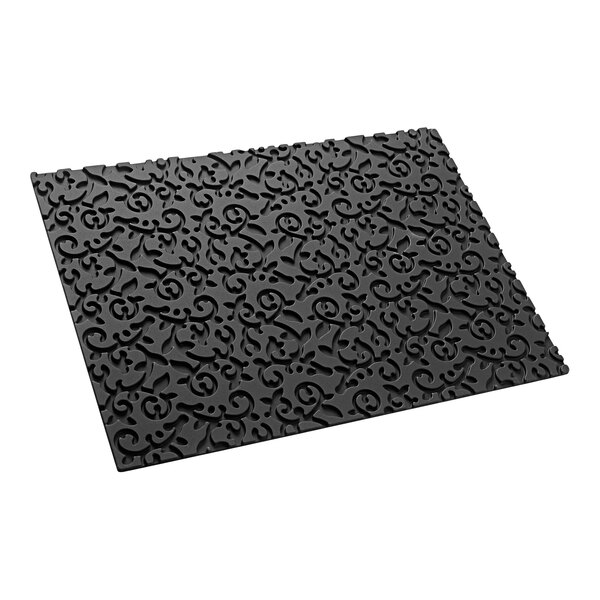 A black mat with an Arabesque pattern on it.