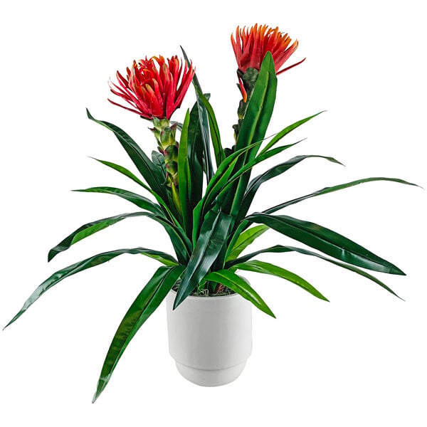 An LCG Sales artificial bromeliad plant with red flowers in a white pot.