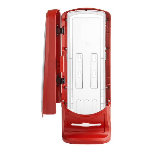 A red plastic Tork Xpressnap interfold napkin dispenser with a white cover.