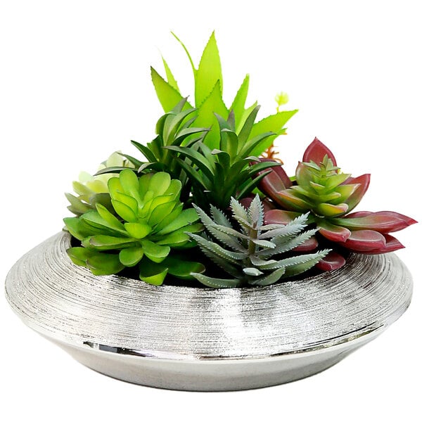 A metallic silver dish with artificial succulent plants in it.