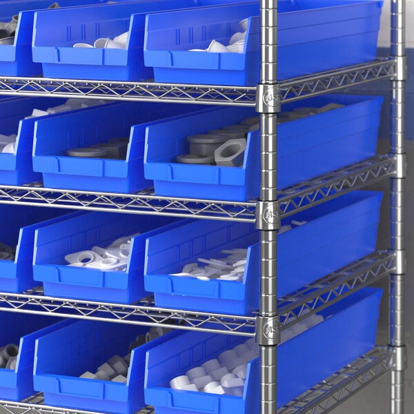 A blue plastic bin on a metal shelf with white objects inside.