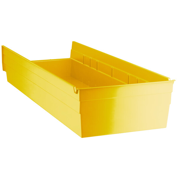 A yellow Regency plastic shelf bin with two compartments and a lid.