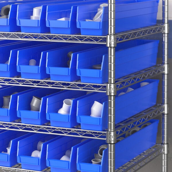 A metal shelf with Regency blue bins holding white containers.