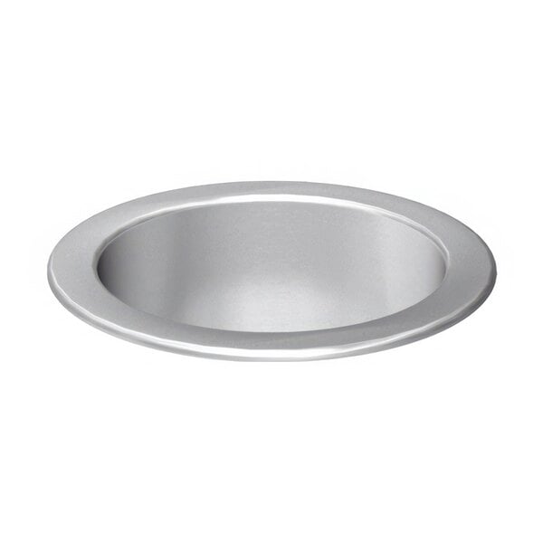 A stainless steel countertop with a round waste chute opening.