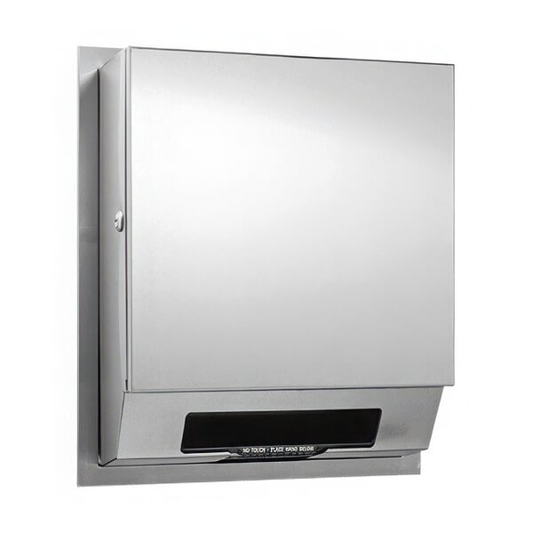 An American Specialties, Inc. stainless steel semi-recessed AC-operated paper towel dispenser.