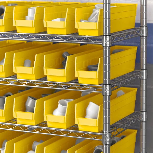 Regency yellow shelf bins on metal shelving.