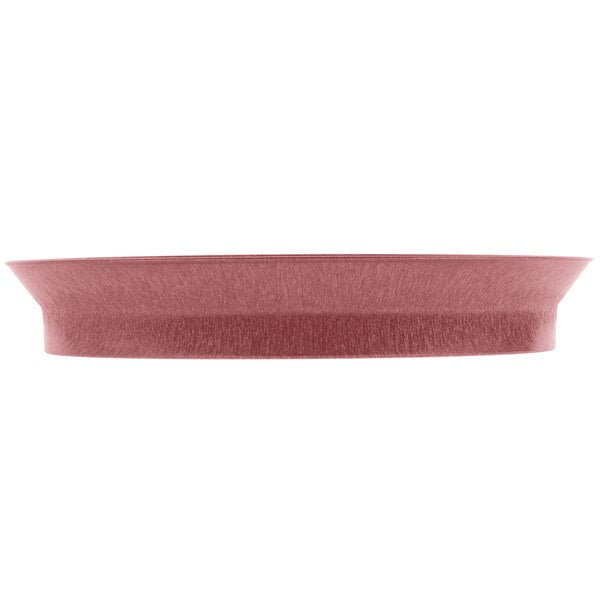 A raspberry polypropylene oval deli server with a rim.