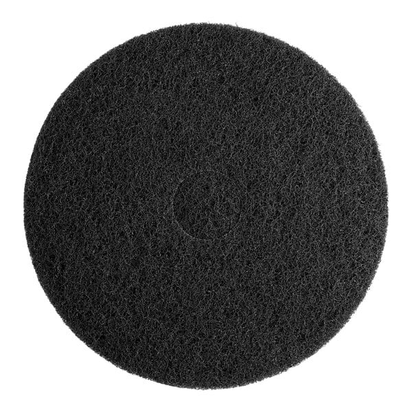 A black circular Lavex Basics stripping floor machine pad with a hole in the middle.