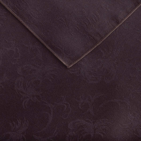 A brown floral patterned Snap Drape cloth table cover.