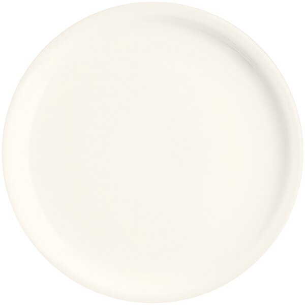 A RAK Porcelain ivory flat plate with a narrow white rim.