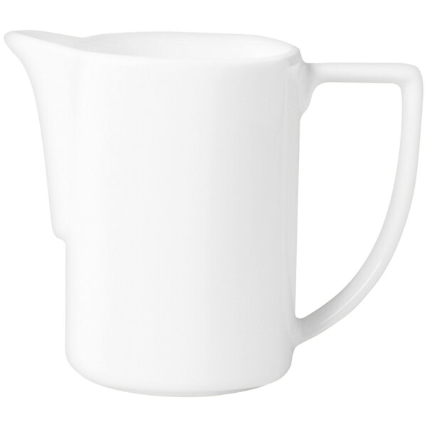 A RAK Porcelain ivory creamer with a handle.