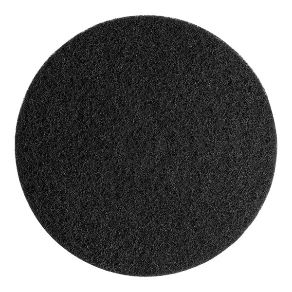 A black circular Lavex Basics floor stripping pad.