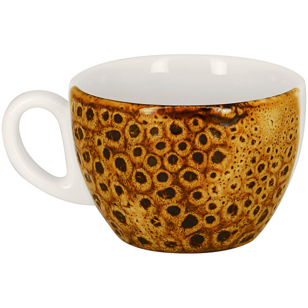 A RAK Porcelain brown coffee cup with a pattern on it.