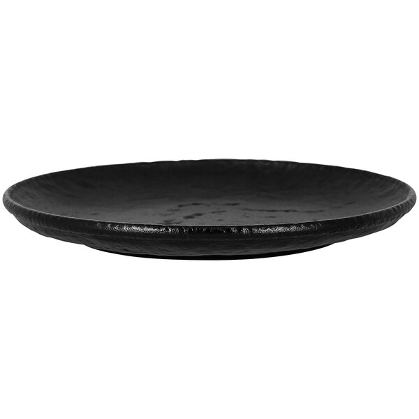 A black RAK Porcelain flat coupe plate with a rim.