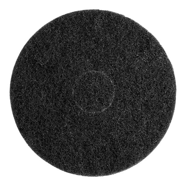 A black circular Lavex Basics stripping floor machine pad.